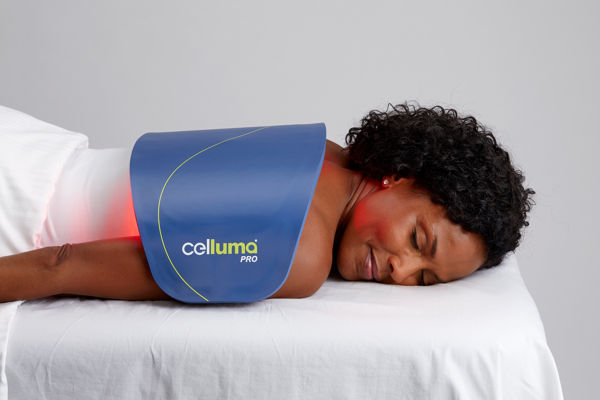 Celluma Pro Panel over a woman's back